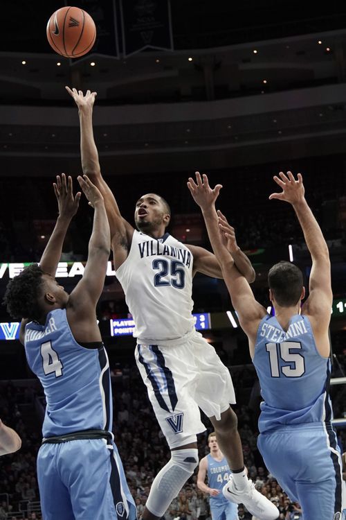 Villanovas Mikal Bridges (25) goes up for a shot between Columbias Rodney Hunter (4) and Gabe Stefanini (15) during the first half of an NCAA college basketball game, Friday, Nov. 10, 2017, in Philadelphia.