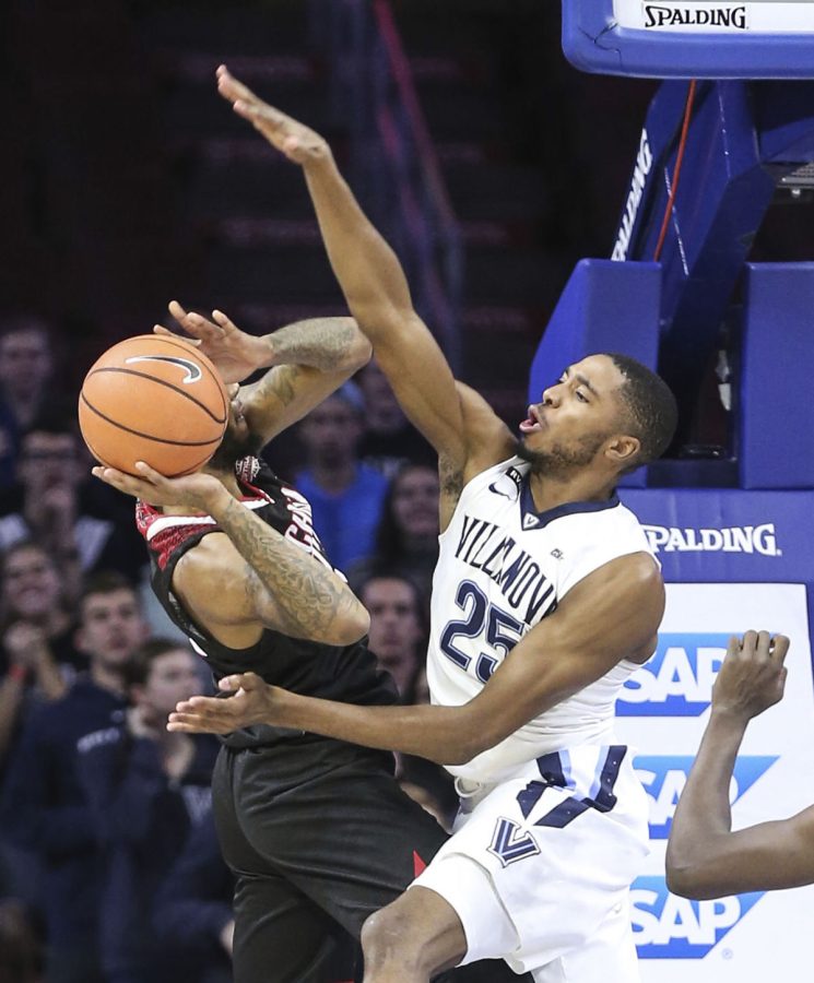 Mikal Bridges tries to block Nicholls States Roddy Peters during the first half of Tuesdays game at Wells Fargo Center.