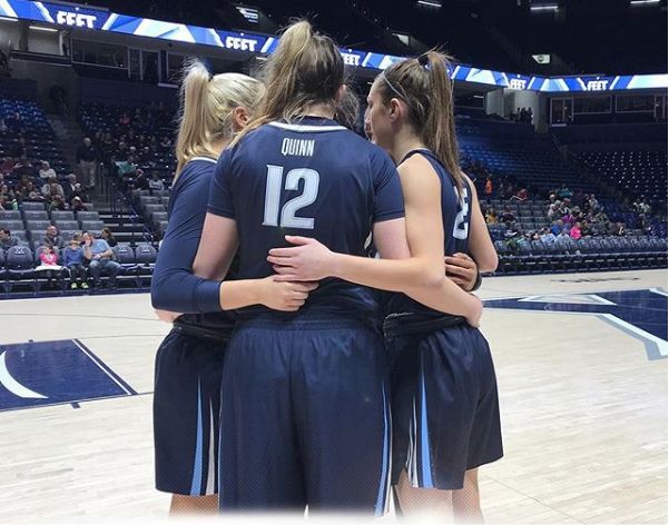 The Wildcats huddle during their game against Xavier.