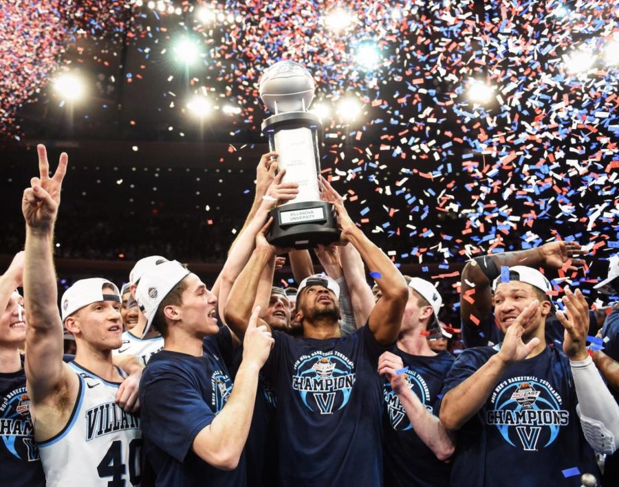 The Wildcats celebrate their Big East Tournament victory over the Providence Friars. 
