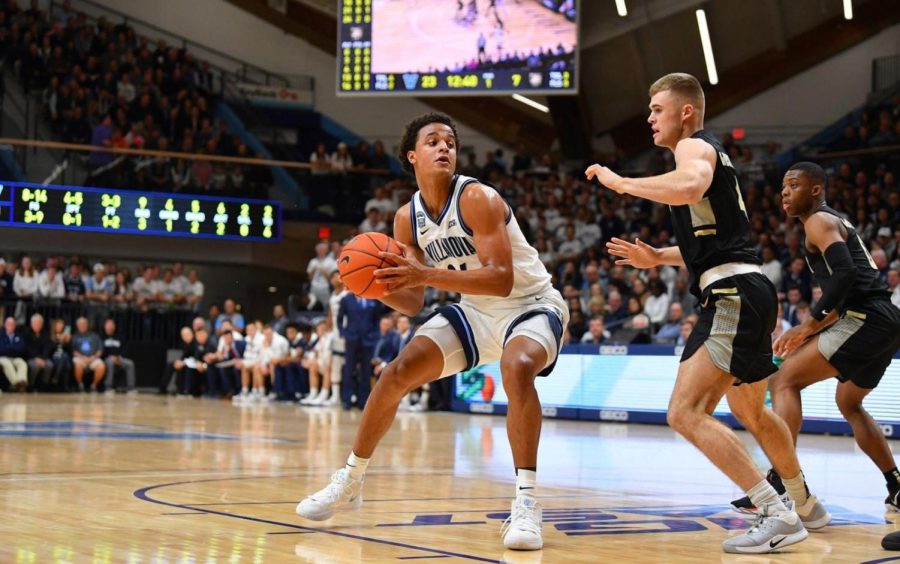 Mens Basketball Marches Past Army