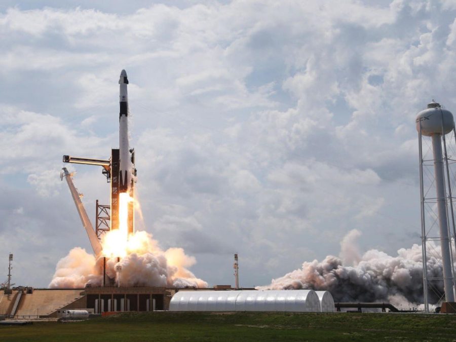 The SpaceX Falcon 9 rocket, with the manned Crew Dragon spacecraft attached, takes off from launch pad 39A at the Kennedy Space Center on May 30 in Cape Canaveral, Florida.