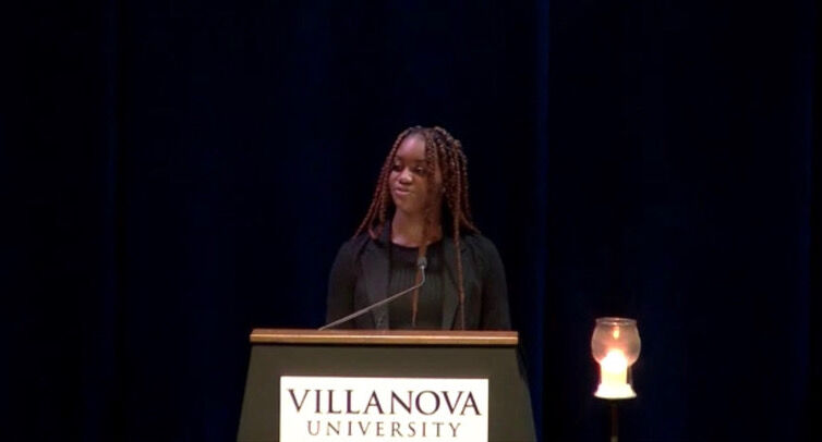 Natalie Nwanekwu offers an expression of thanks on behalf of the Vigil Planning Committee.