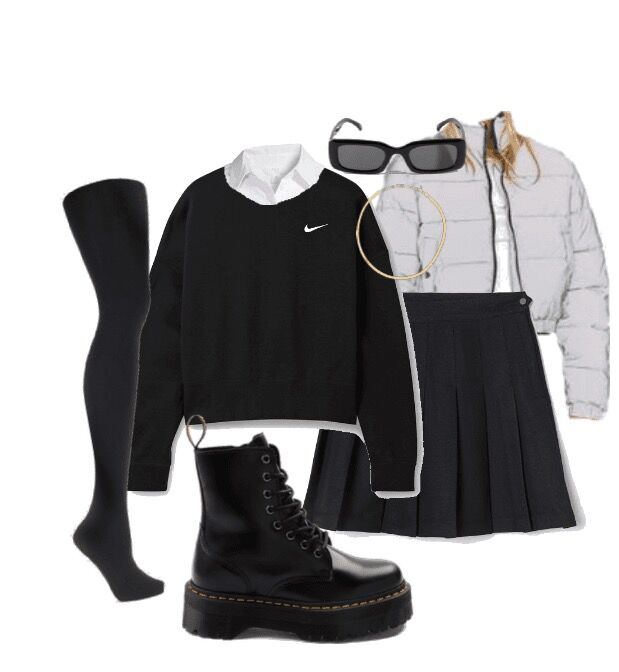 This+outfit+features+a+tennis+skirt+and+an+oversized+crewneck+sweatshirt.%C2%A0