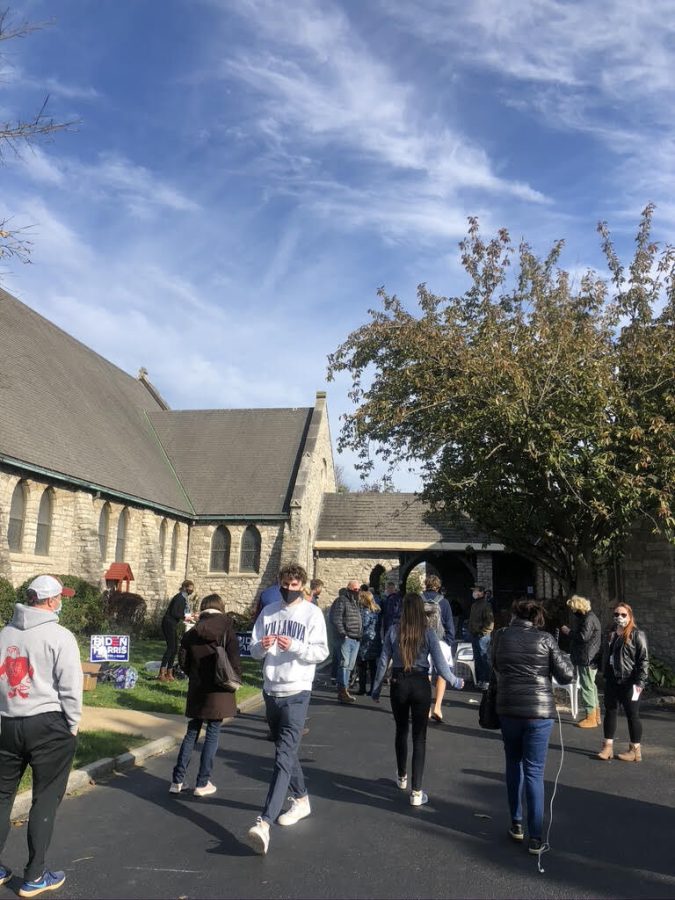Students waiting inside and outside to vote at St. Mary’s Episcopal Church in Wayne.