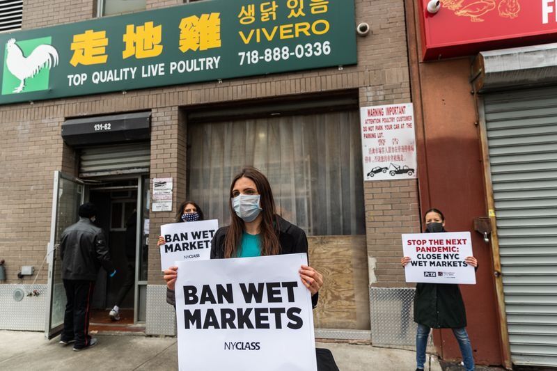 Protesters advocate for policy to protect against another pandemic.