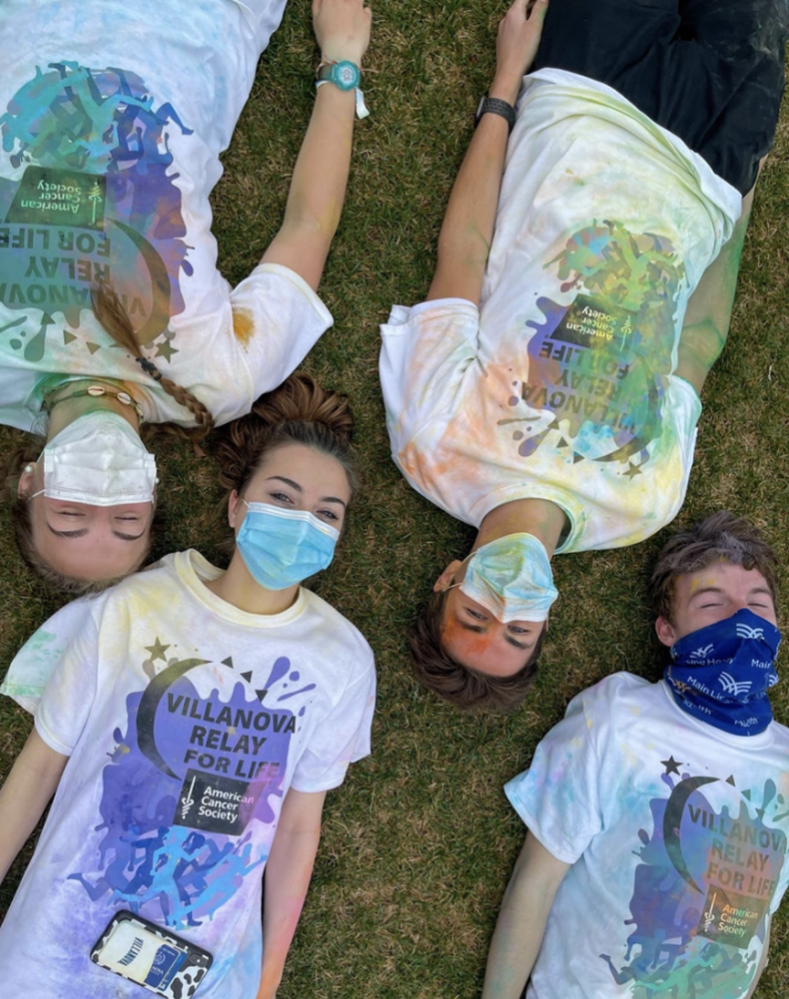 (From left to right:) Freshmen Sarah Ager, Margaux Snow, Joe Adams and Brendan Tierney celebrate the Color Run 5K for the American Cancer Society at the Riley Ellipse.
