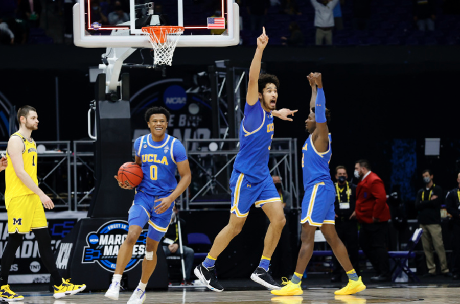 The+UCLA+Bruins+celebrate+their+51-49+victory+over+Michigan+in+an+Elite+Eight+matchup+and+punch+their+ticket+to+a+Final+Four+matchup+with+number+one+overall+seed+Gonzaga.