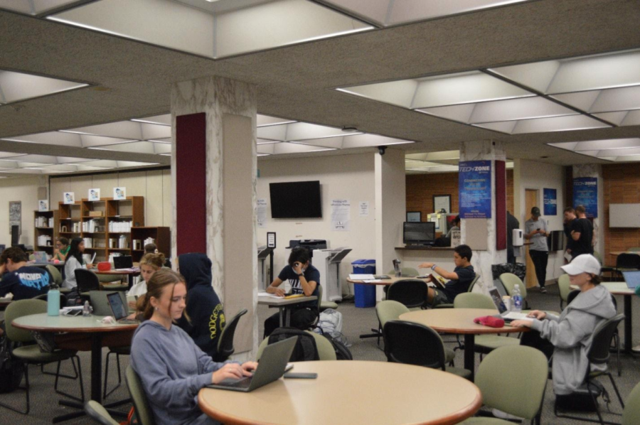 Students are hard at work on the first floor of the Falvey Memorial Library.