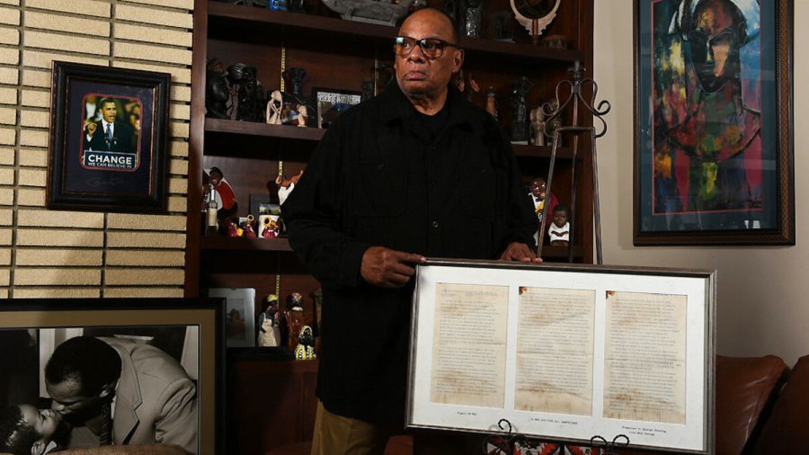 Mr. Raveling with the original copy of MLKs speech.