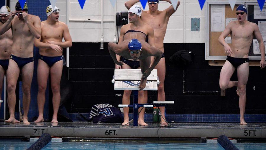 Jesse Marsh helped the 400-freestyle relay get second over the weekend. 
