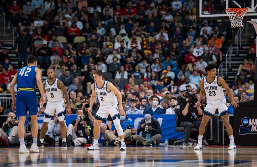 Collin Gillespie (center) and Jermaine Samuels (right) defend in the first round of the 2022 NCAA Tournament. Both signed contracts with NBA teams as undrafted free agents.