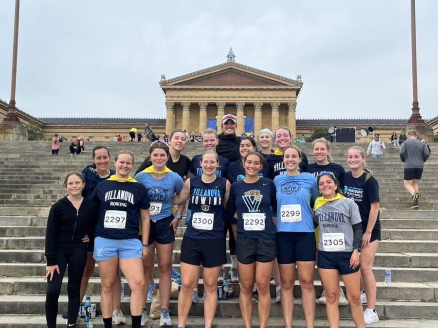 The Villanova Rowing team poses at the Rocky Steps.
