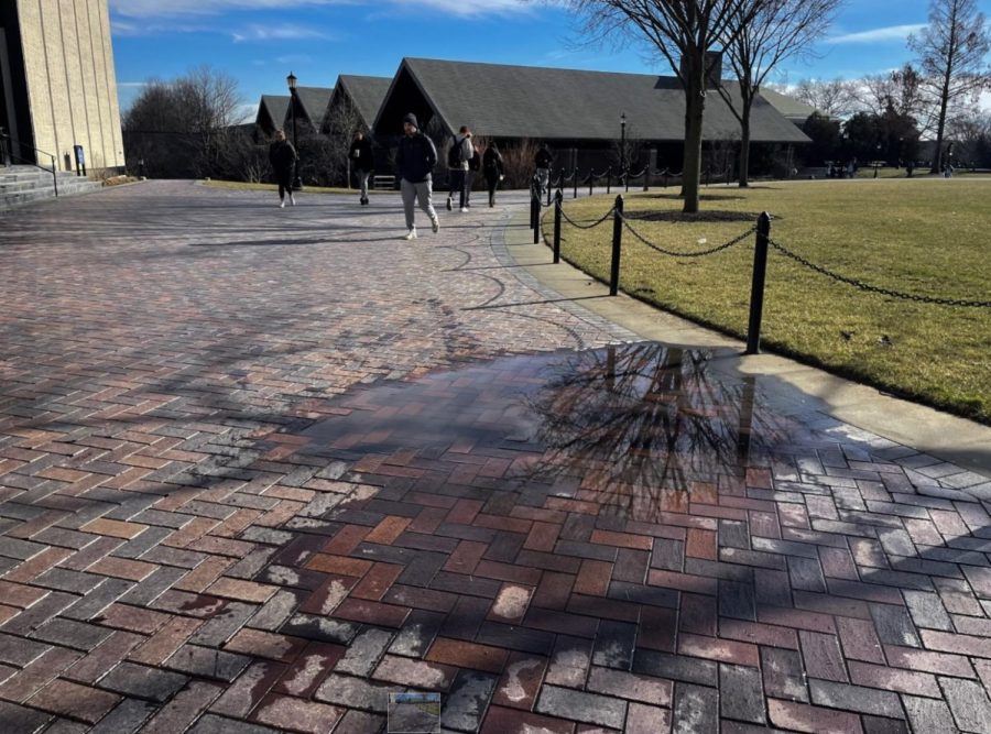 A+puddle+accumulates+in+front+of+the+Villanova+bookstore+whenever+it+rains.