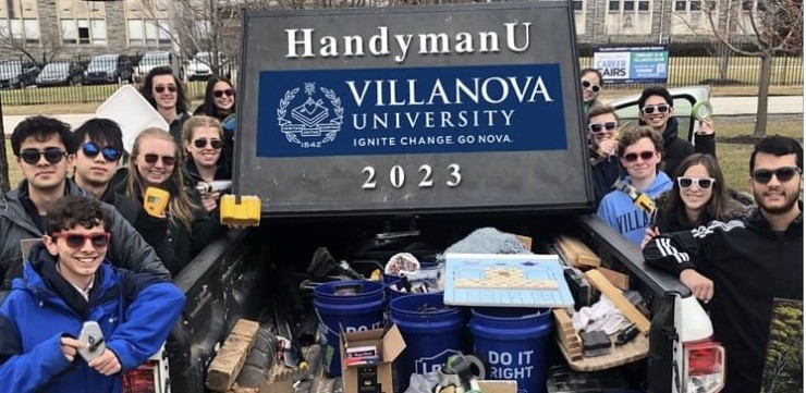 Students in the HandymanU course pose with their logo.
