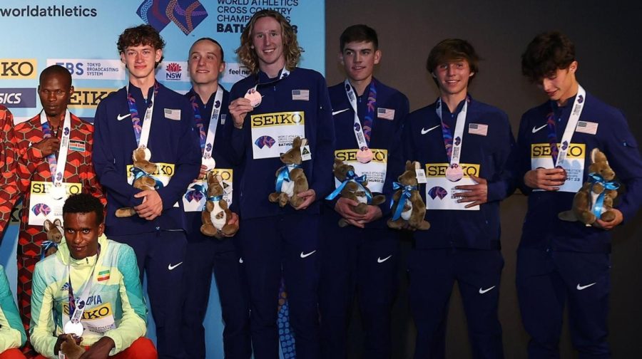 Marco Langon (pictured second from the right) helped lead team USA to a bronze medal at the World Cross Country Championships. 