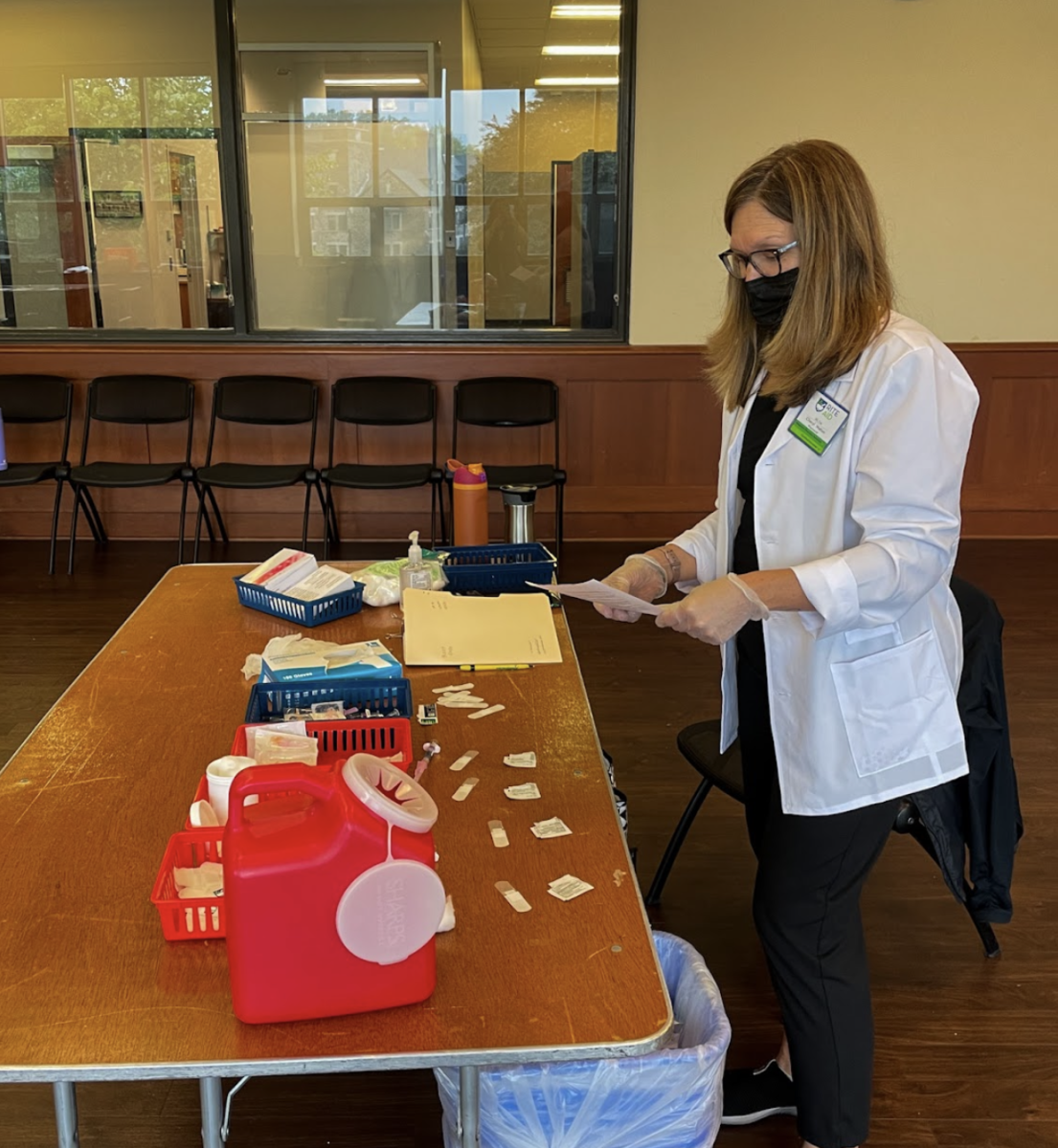 A nurse at the clinic prepares to give out flu shots to Villanova community members.
