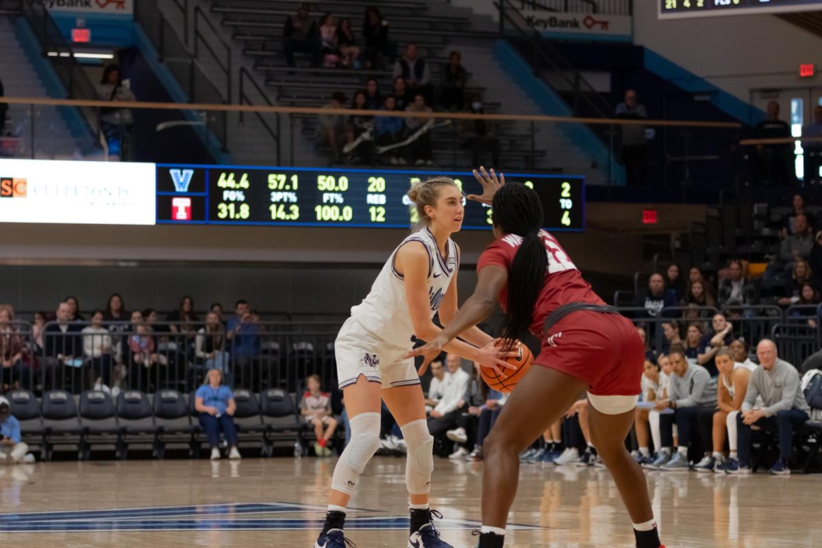 Junior guard Lucy Olsen led scorers with 14 points against Holy Cross. 