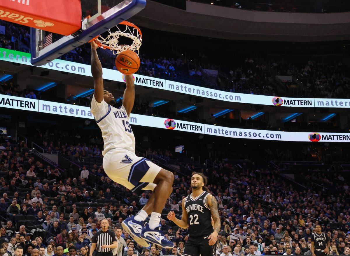 Graduate guard Hakim Hart dunks late in the second half to give Villanova a 22-point lead over Providence. Hart finished the night with nine points, contributing to Villanovas 28–0 advantage in bench points.