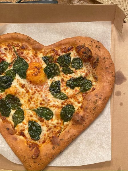 Single or taken, commemorate Valentine’s Day with a heart shaped pizza and chocolate covered strawberries. 