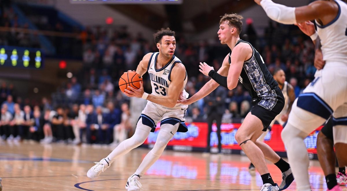 Graduate+forward+Burton+collected+eight+rebounds+in+Villanovas+win+over+Georgetown+on+Feb.+27%2C+marking+his+1%2C000th+rebound+in+his+career.+