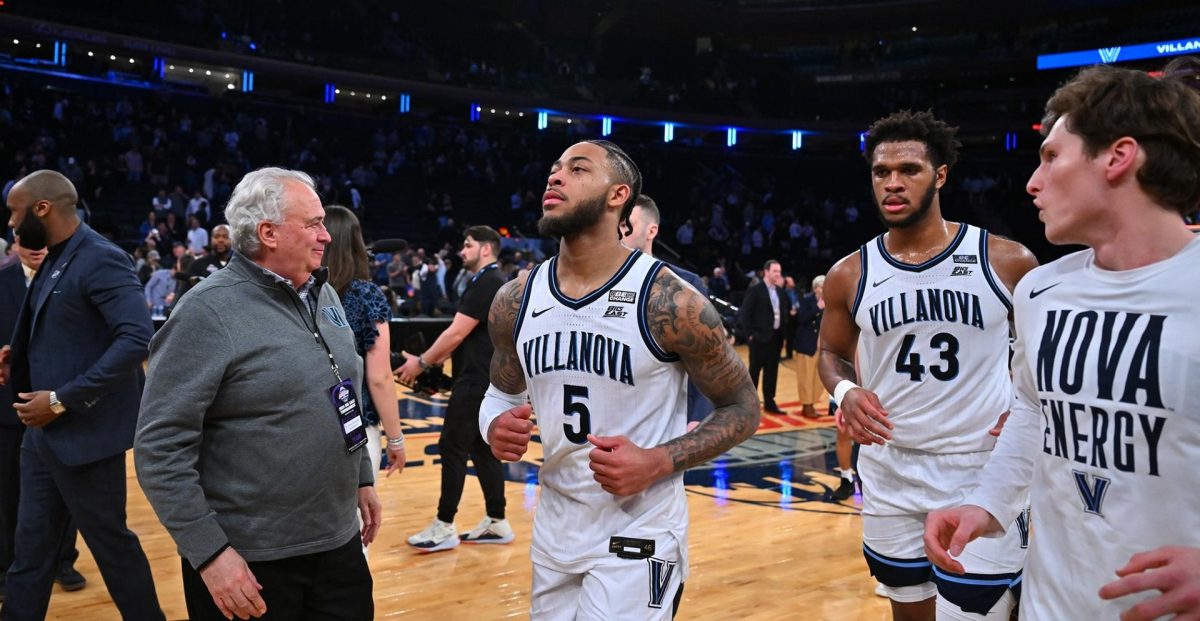 Graduate guard Justin Moore scored a game-winning three-pointer with 8.8 seconds to go, putting Villanova past DePaul 58–57 on Wednesday night.