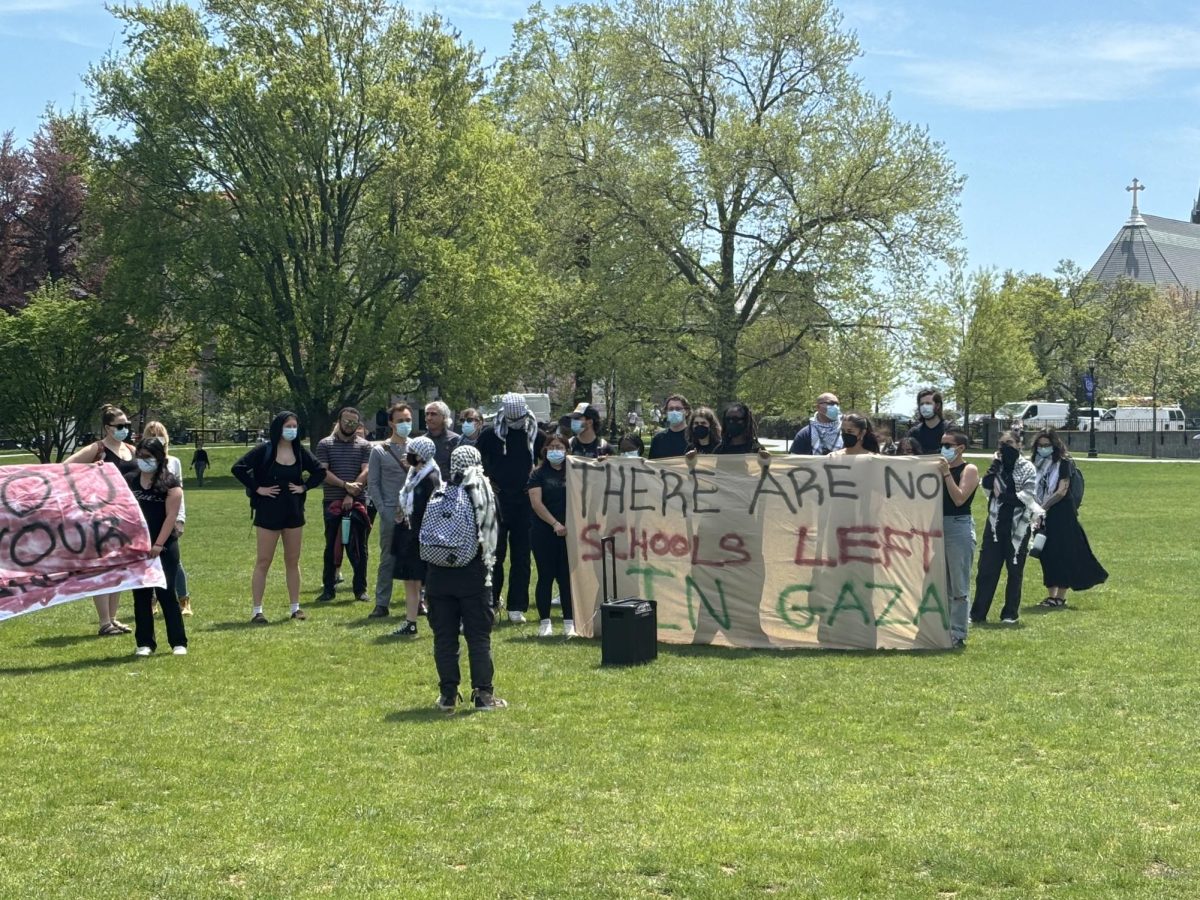 Students and faculty rally outside of John Barry to raise awareness for Palestine. 
