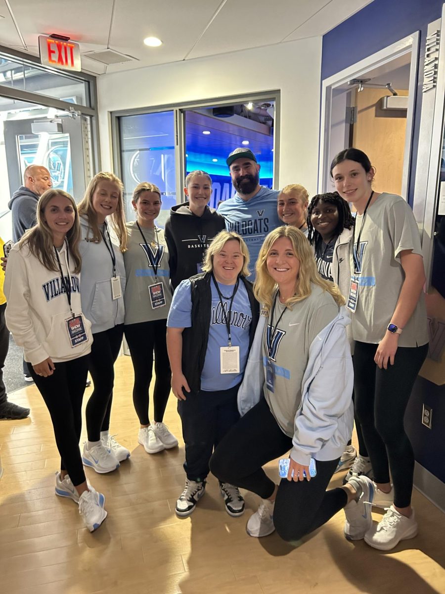 Rachel Grace (lower center) with Jason Kelce and fellow women’s basketball managers.