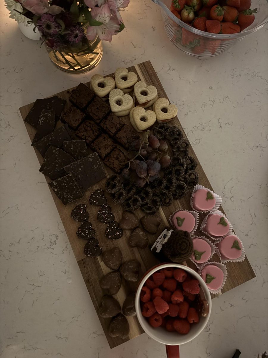 In lieu of a date, spend the night making treat boards with your friends.