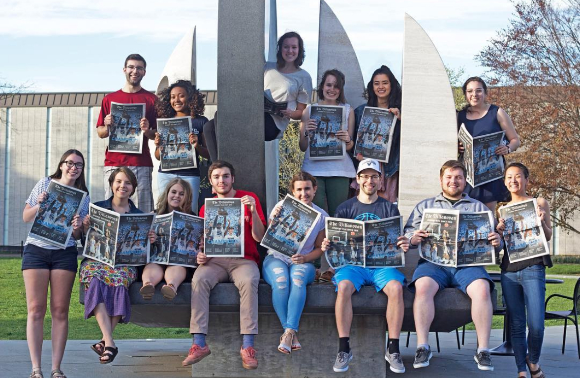 The 2016 Villanovan Staff posing with the March Madness Championship edition. 
