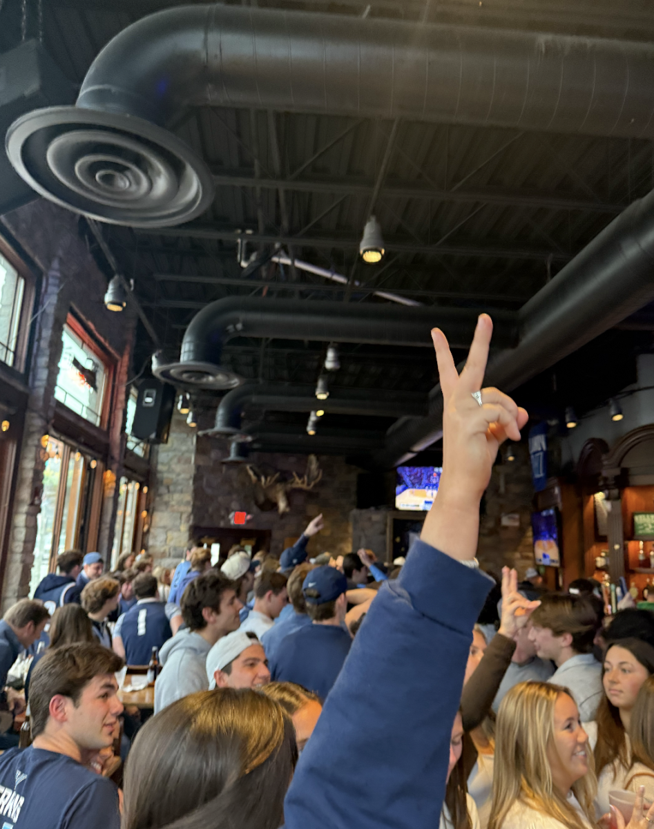 Spirits were high as students tuned into the game from local bars. 